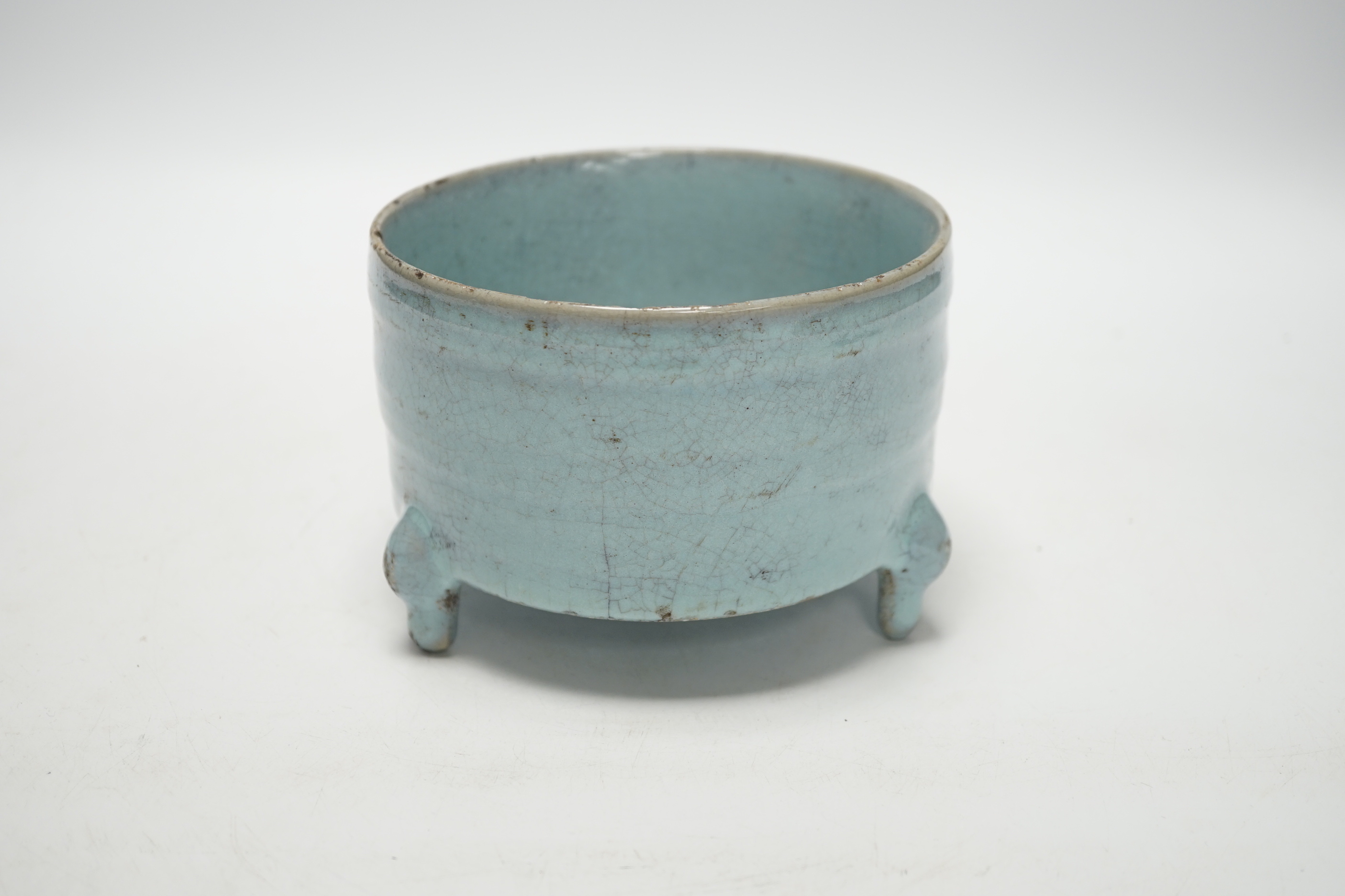 A Chinese Jun type tripod censer, 10cm tall